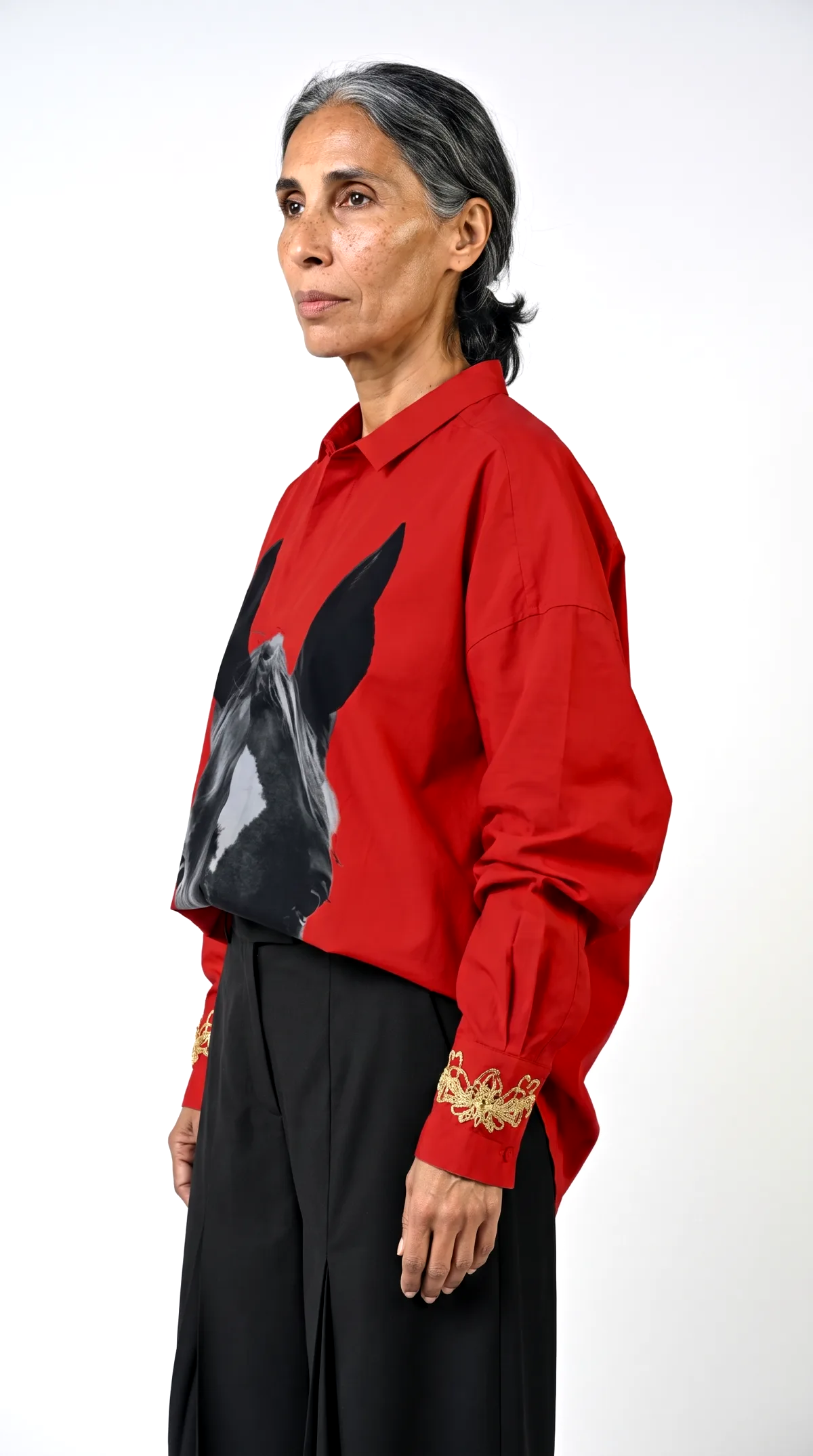 AI generated product photo of a horse print shirt in a white studio setting